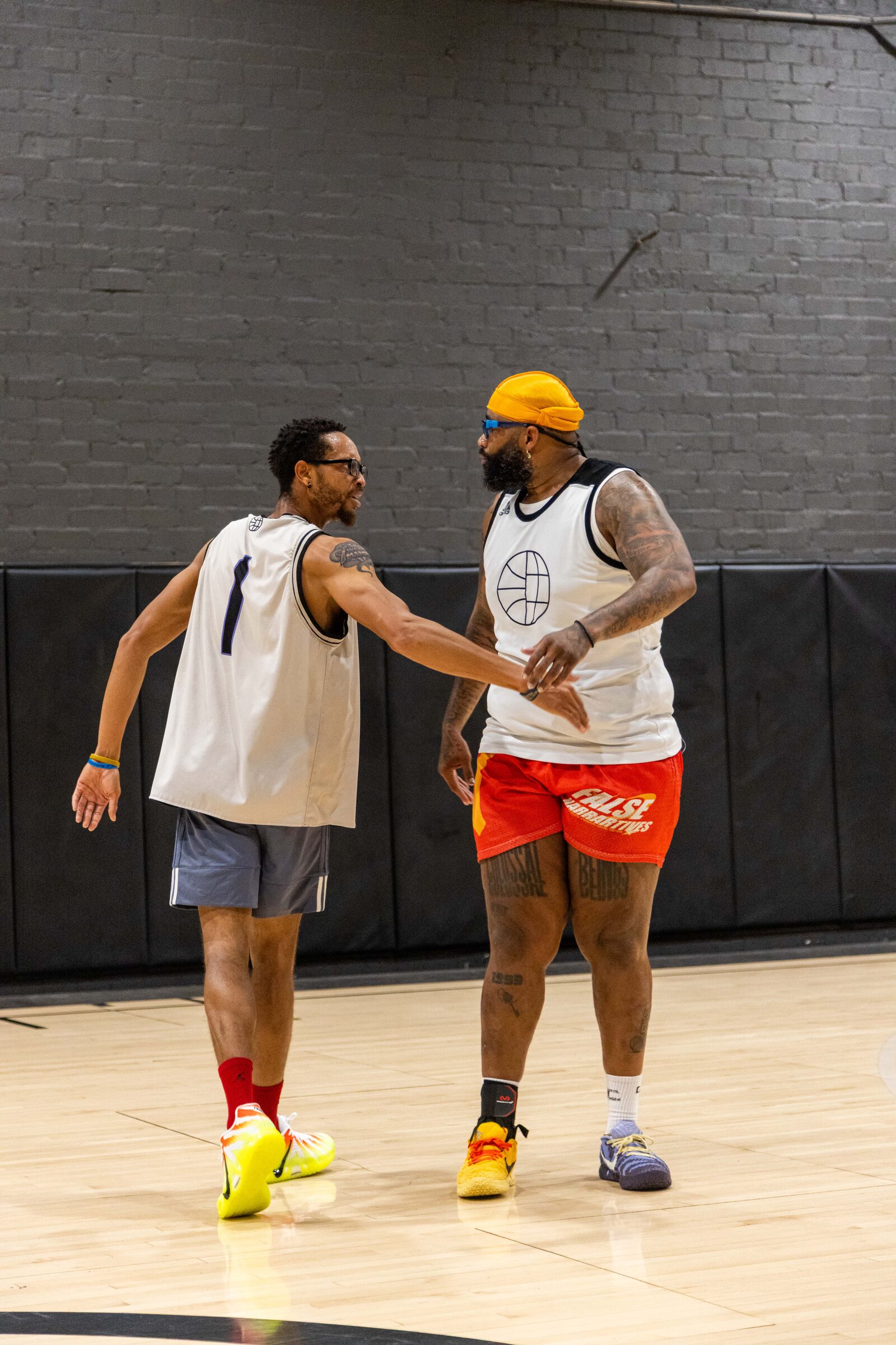 Two players talking after a run